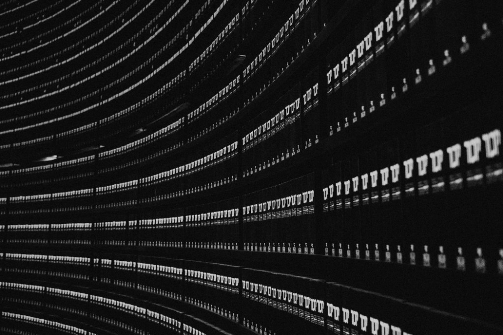 Curved archive shelves of bound records